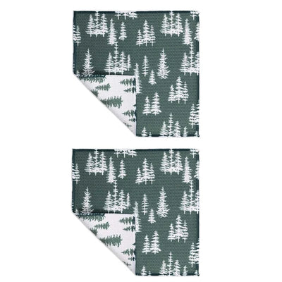 Two fabric swatches with a forest pattern on a white background