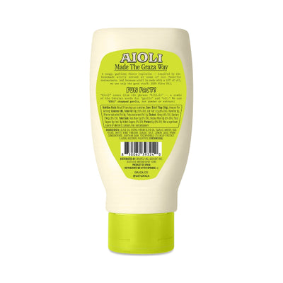 The back of an AIOLI 'Made The Graza Way' Fun Paste squeeze bottle, featuring a light green label with product details, a barcode, and a lime green cap, on a white background.