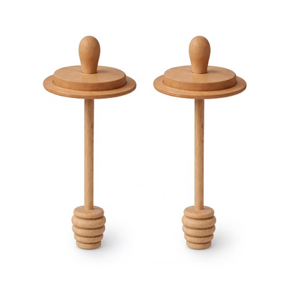 Two natural wood baby teething rings with looped handles and flared bases, shown side by side on a white background.