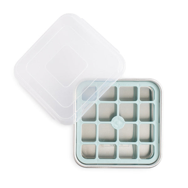 Ice cube tray with lid on a white background